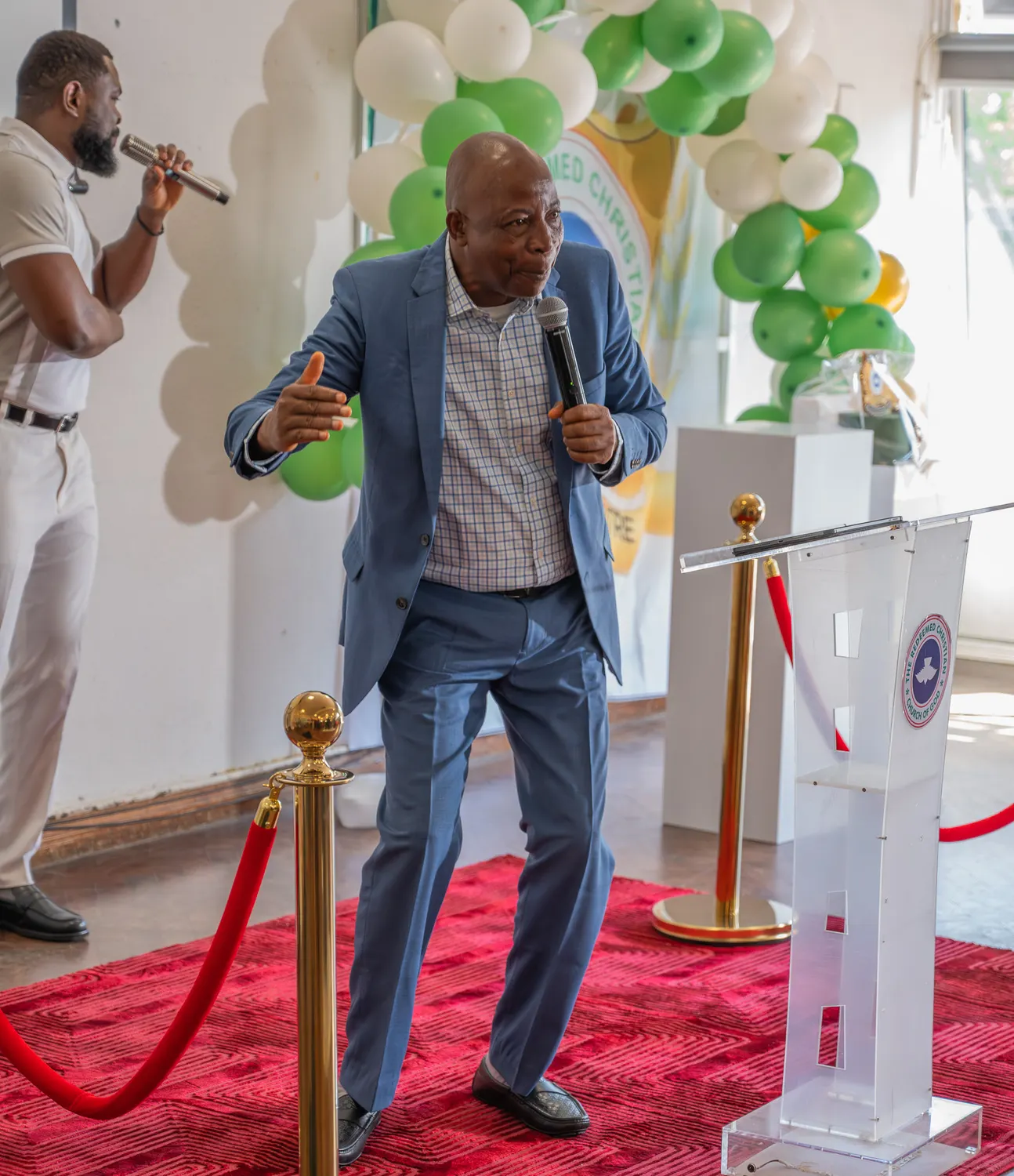 Church leader speaking during a Victory Centre service